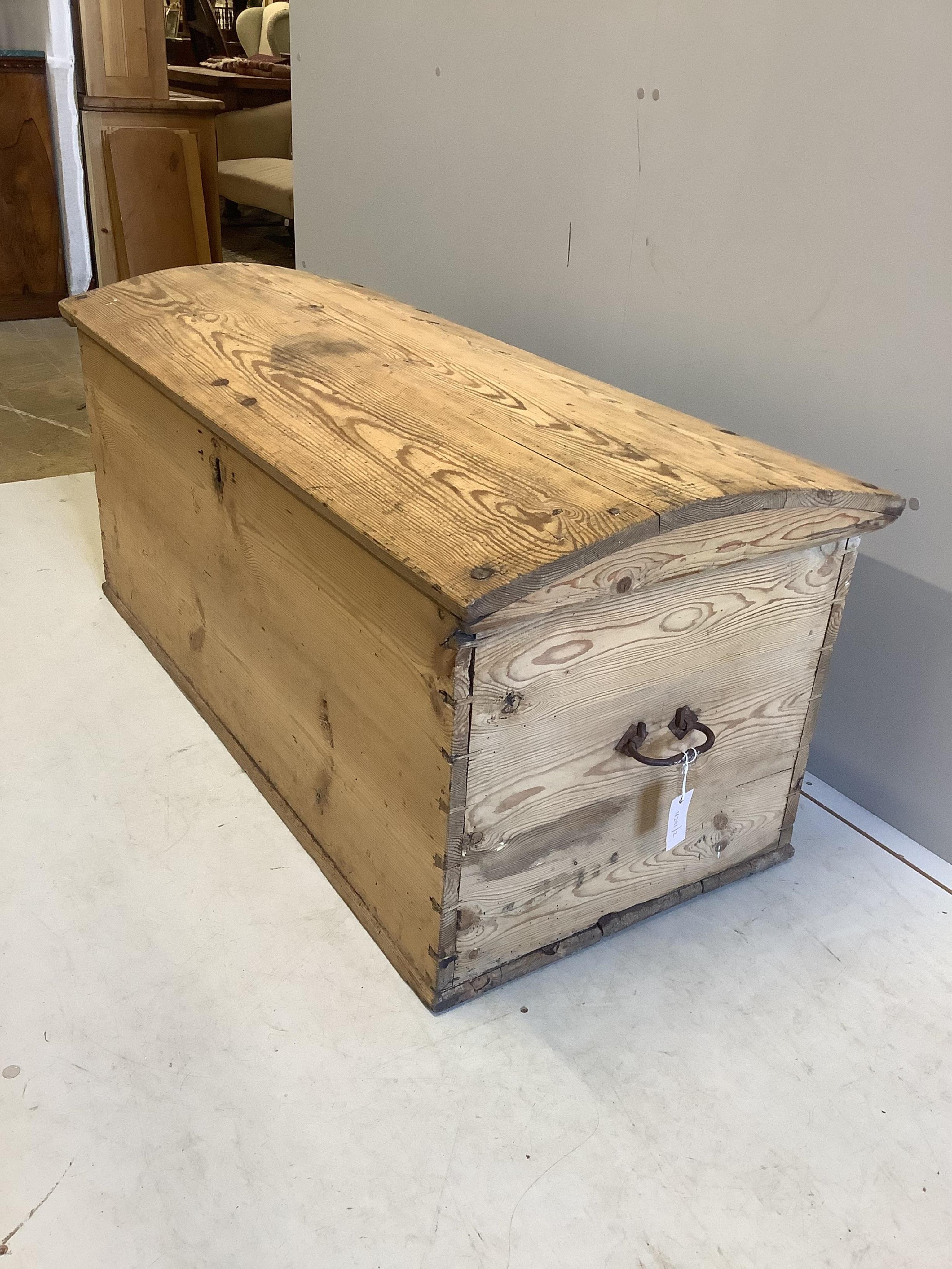 A 19th century Continental pine domed top trunk, width 127cm, depth 58cm, height 57cm. Condition - fair